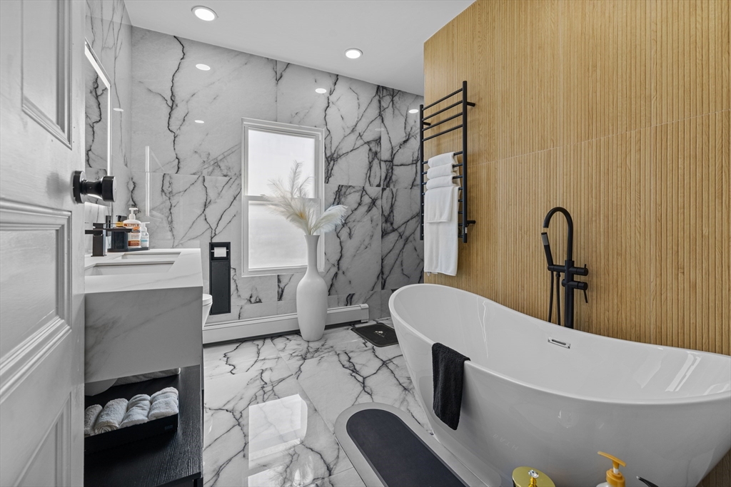 499 Madison Street Fall River, MA 02720 - Photo 28 of 38 a bathroom with a sink a toilet and shower