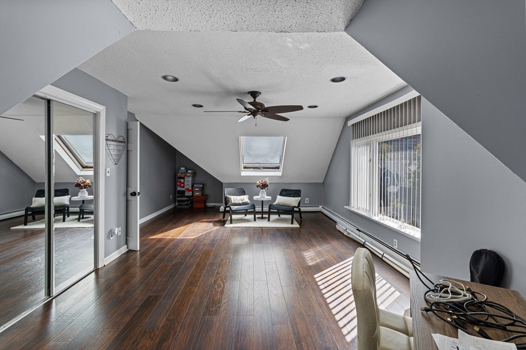 499 Madison Street Fall River, MA 02720 - Photo 35 of 38 a living room with furniture and wooden floor