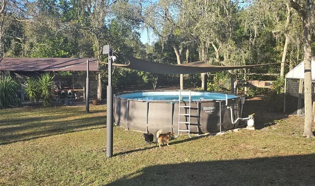 a view of a barn with a yard