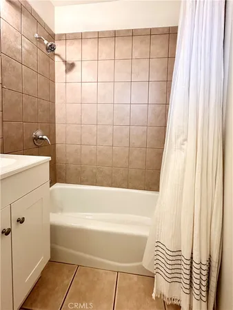 a bathroom with a sink and a bathtub