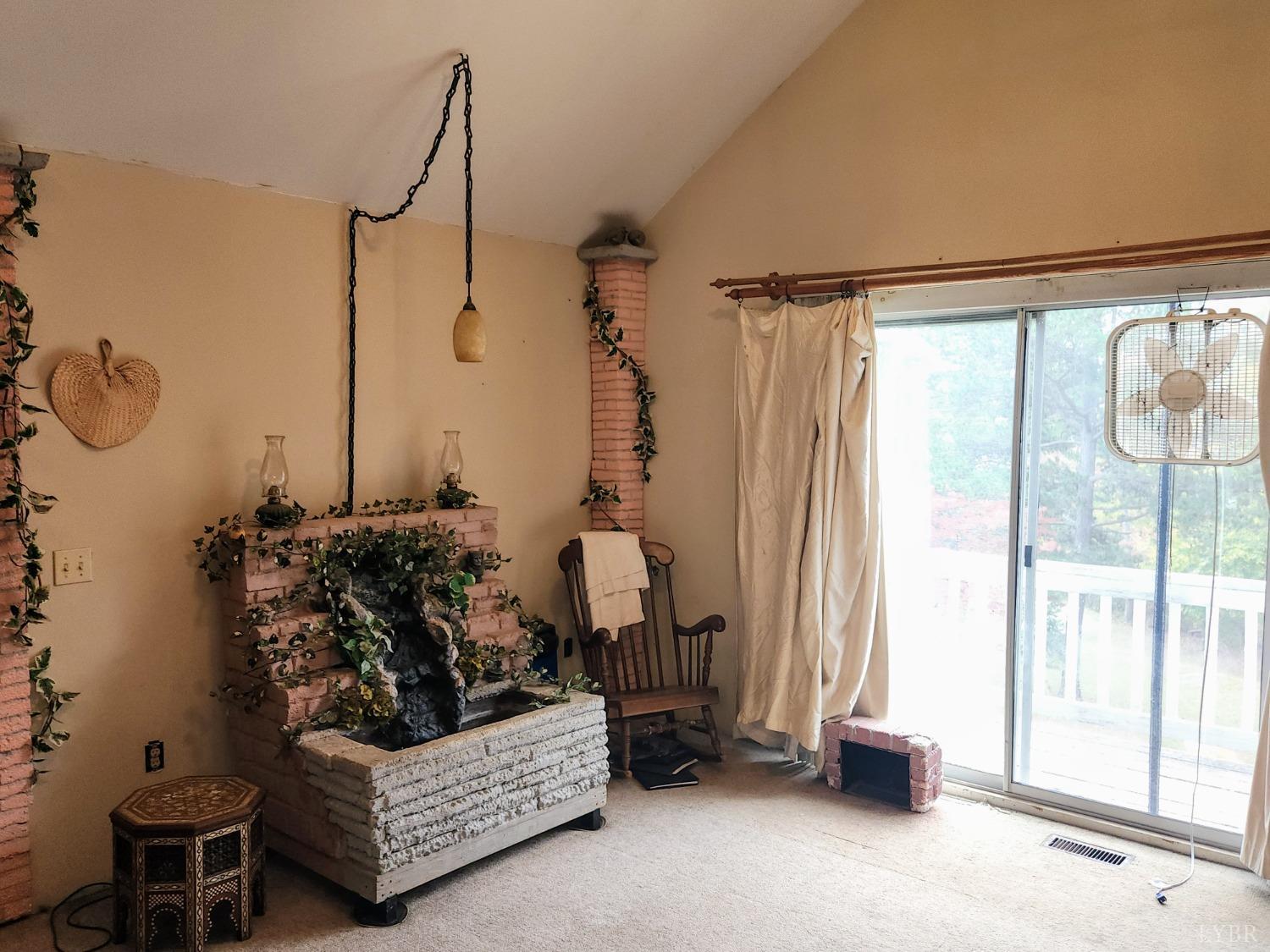 159 Buck Hill Drive Amherst, VA 24521 - Photo 16 of 31 a living room with furniture and a window