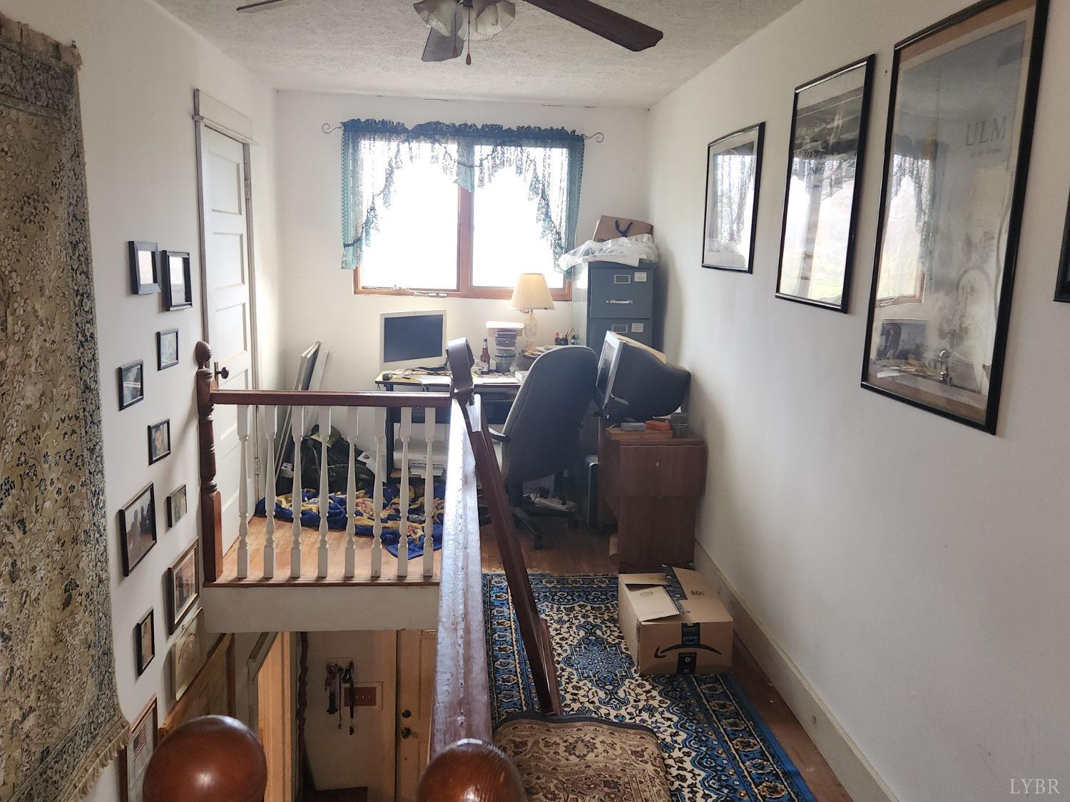 159 Buck Hill Drive Amherst, VA 24521 - Photo 18 of 31 a living room with furniture and a window