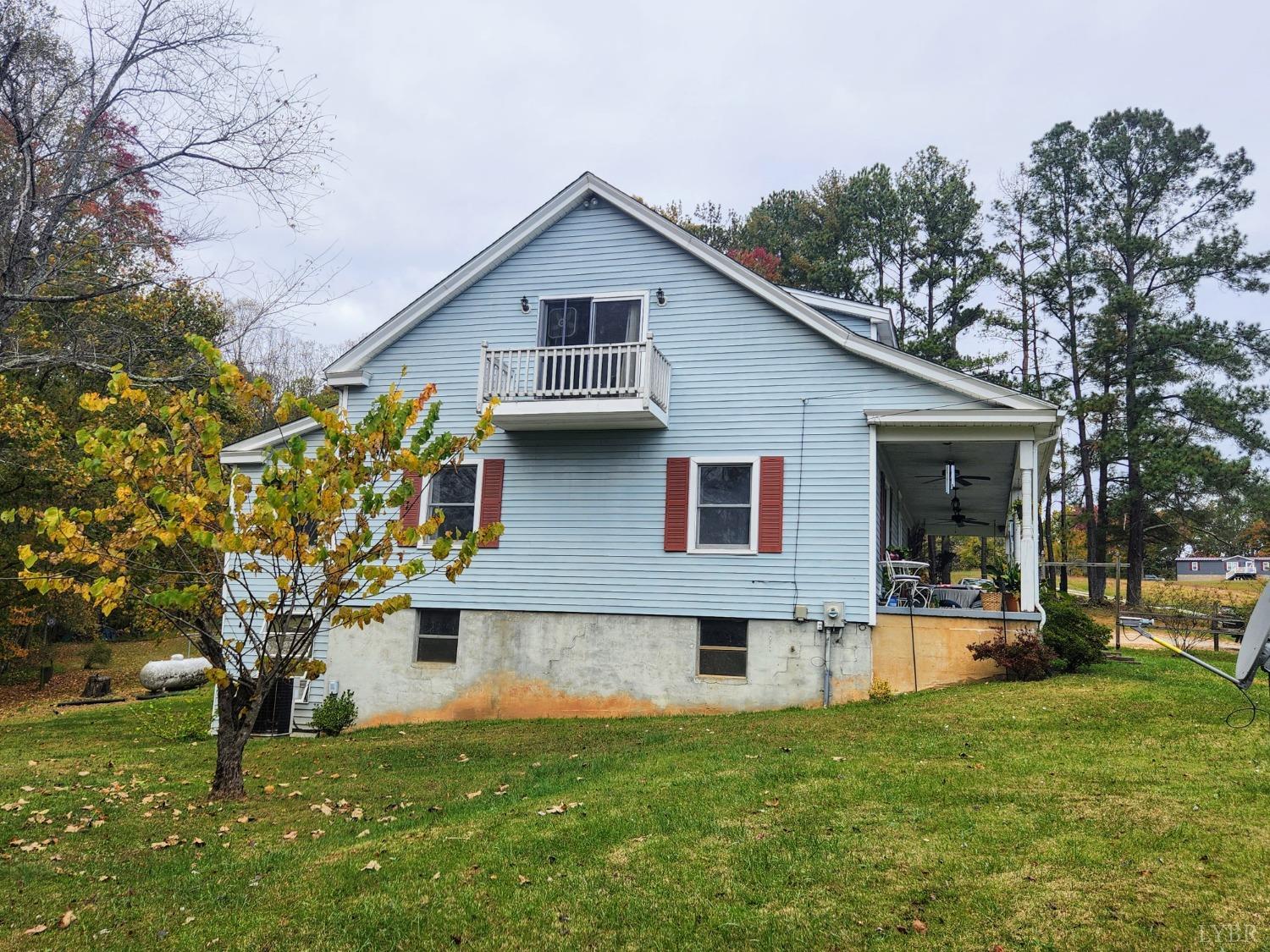 159 Buck Hill Drive Amherst, VA 24521 - Photo 2 of 31 a front view of a house with a yard