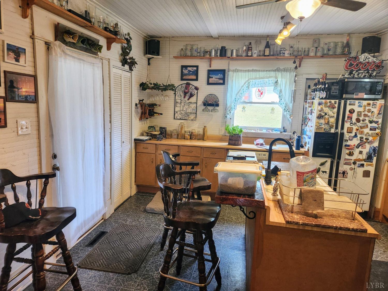 159 Buck Hill Drive Amherst, VA 24521 - Photo 29 of 31 a view of a dining room with furniture window and wooden floor