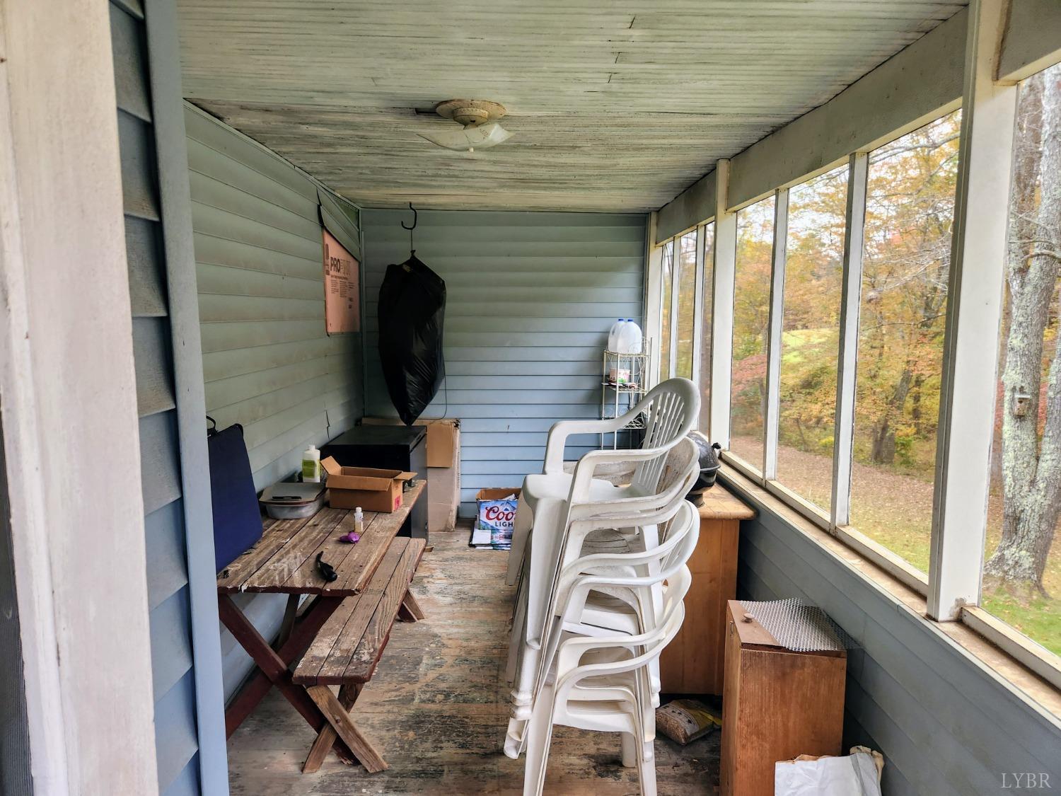 159 Buck Hill Drive Amherst, VA 24521 - Photo 31 of 31 a view of a chairs and table in a balcony