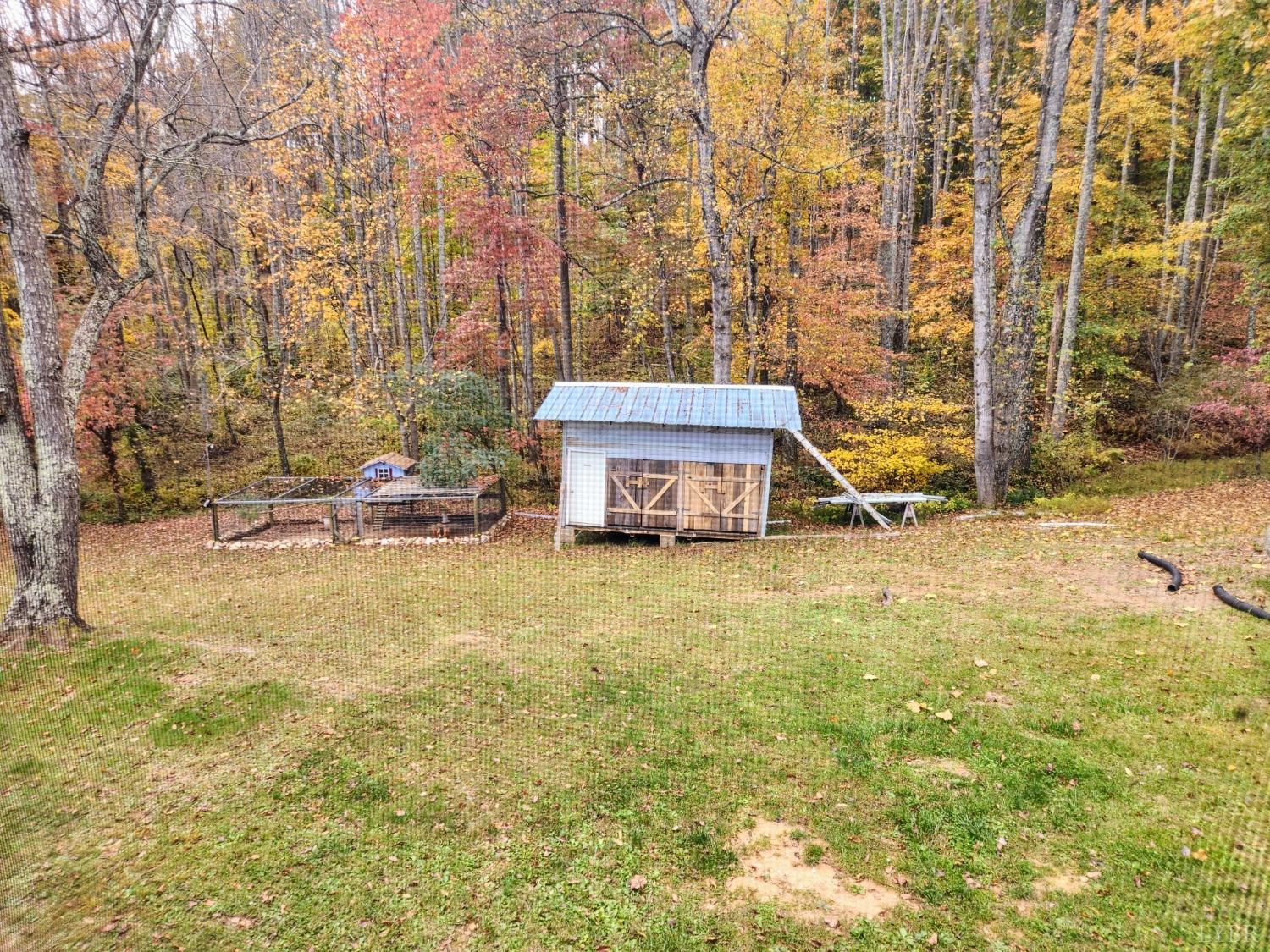 159 Buck Hill Drive Amherst, VA 24521 - Photo 9 of 31 a view of a house with a yard and sitting area