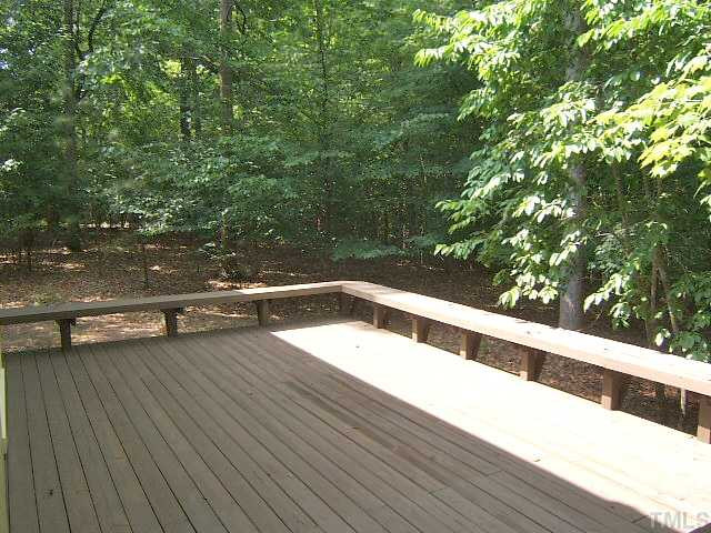 Oversized 28'x16' deck with bench seating and a private wooded view! Patio/Deck