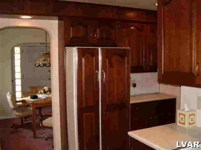 1814 Ruth Street Allentown, PA 18104 - Photo 3 of 5 a bathroom with a sink and a mirror