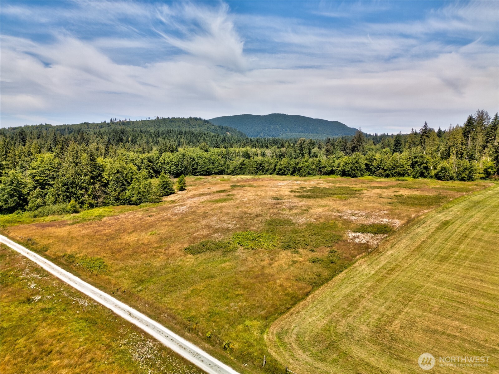 0 Colony Road Bow, WA 98232 - Photo 4 of 10 a view of an outdoor space and a lake view