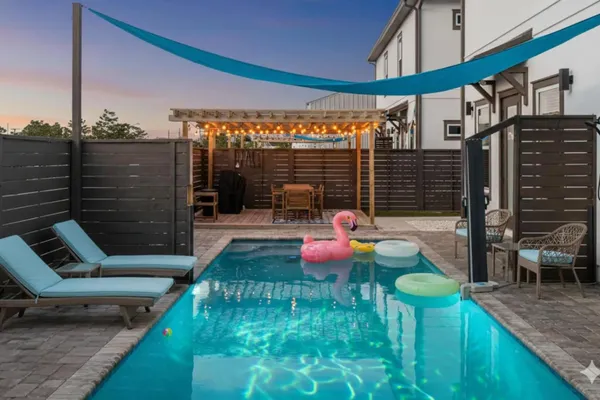a patio with table and chairs