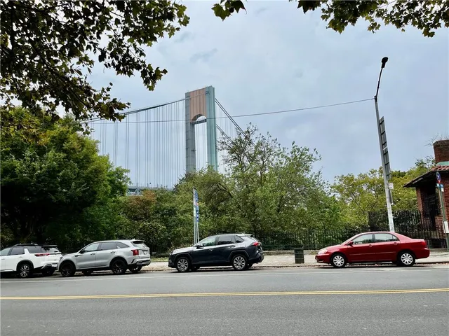 a front view of a building with street view