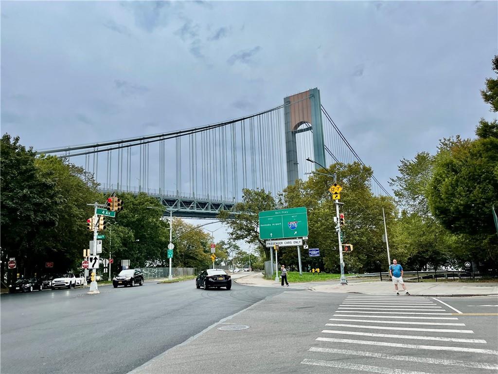 9965 Shore Road, Unit 6C Brooklyn, NY 11209 - Photo 33 of 37 a view of a street with cars on road