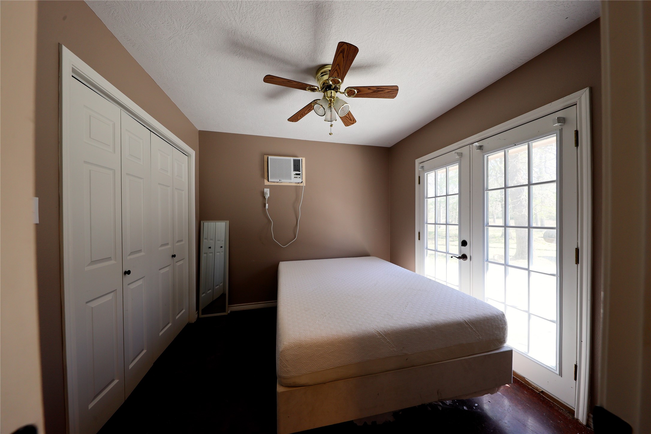 3337 Brunes Mill Road Columbus, TX 78934 - Photo 30 of 48 a bedroom with a bed and a window