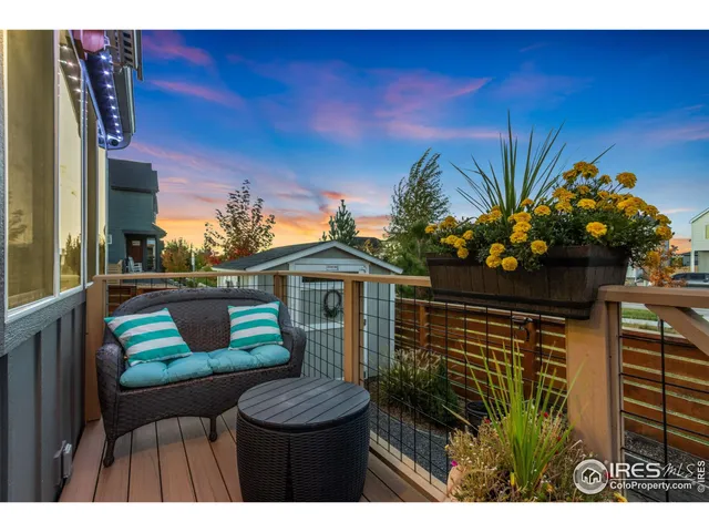 a view of a chairs and table in a patio
