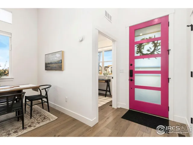 a workspace with furniture and window