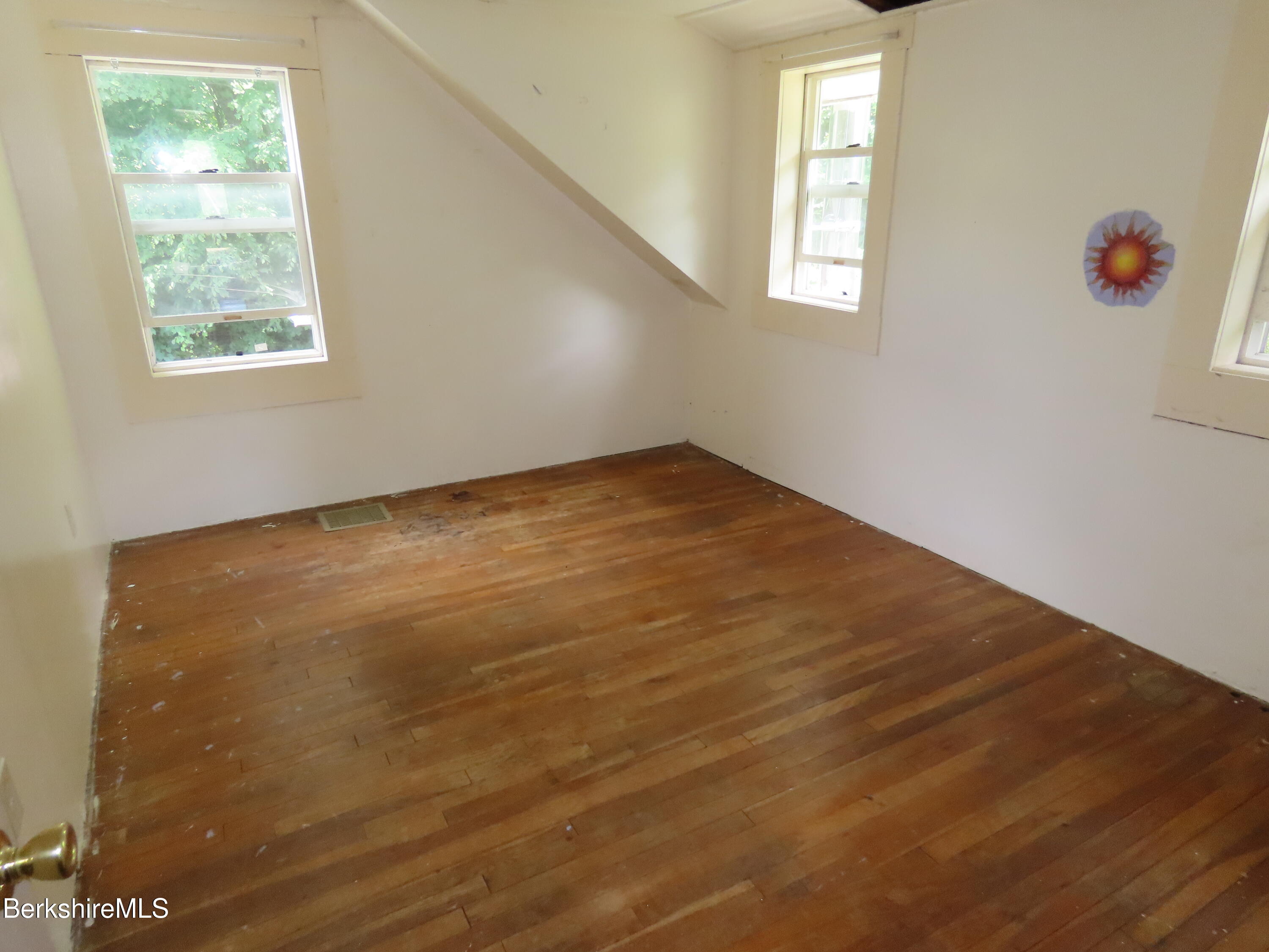 450 River Road Clarksburg, MA 01247 - Photo 25 of 45 an empty room with a window