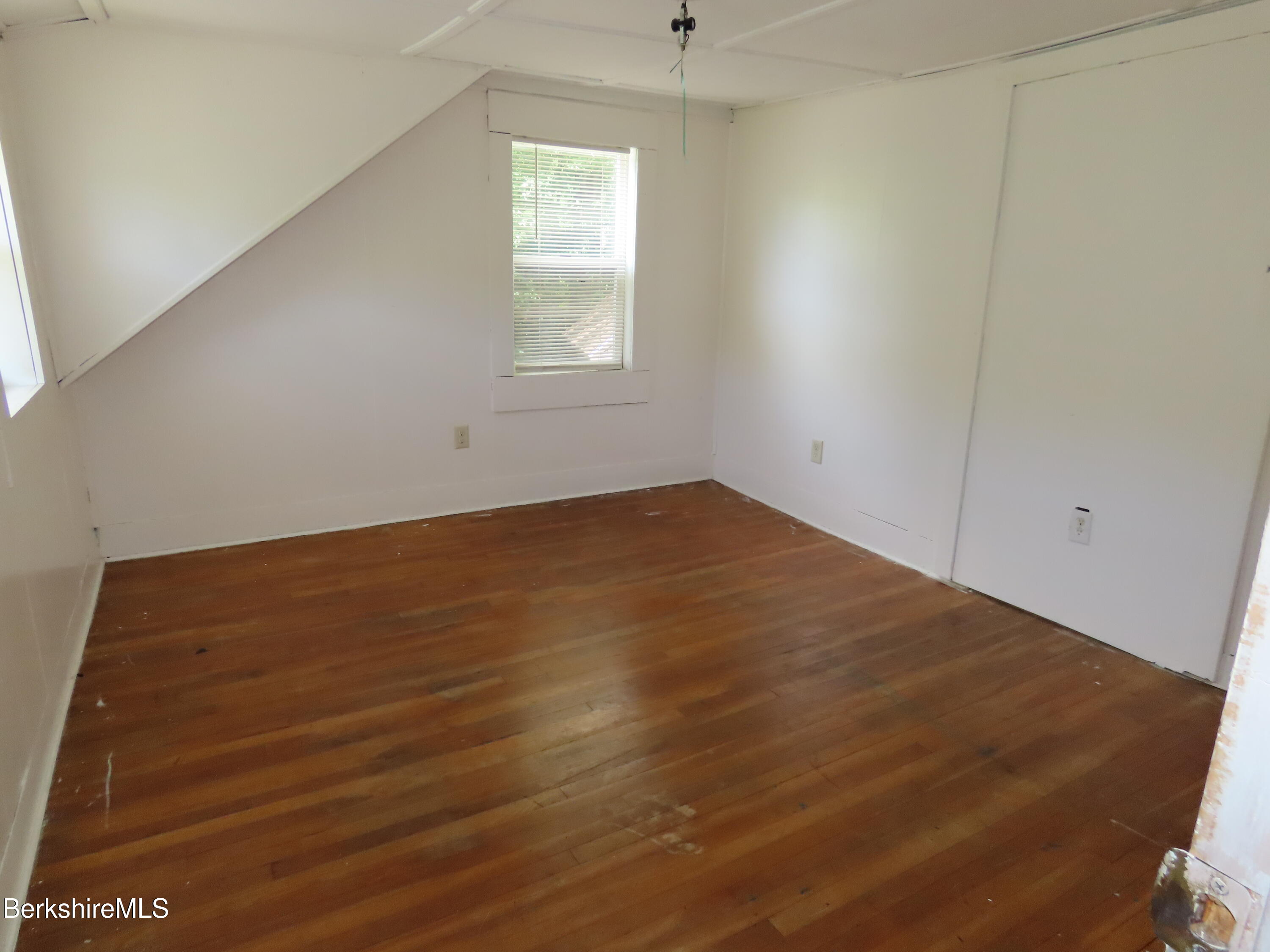 450 River Road Clarksburg, MA 01247 - Photo 27 of 45 an empty room with windows