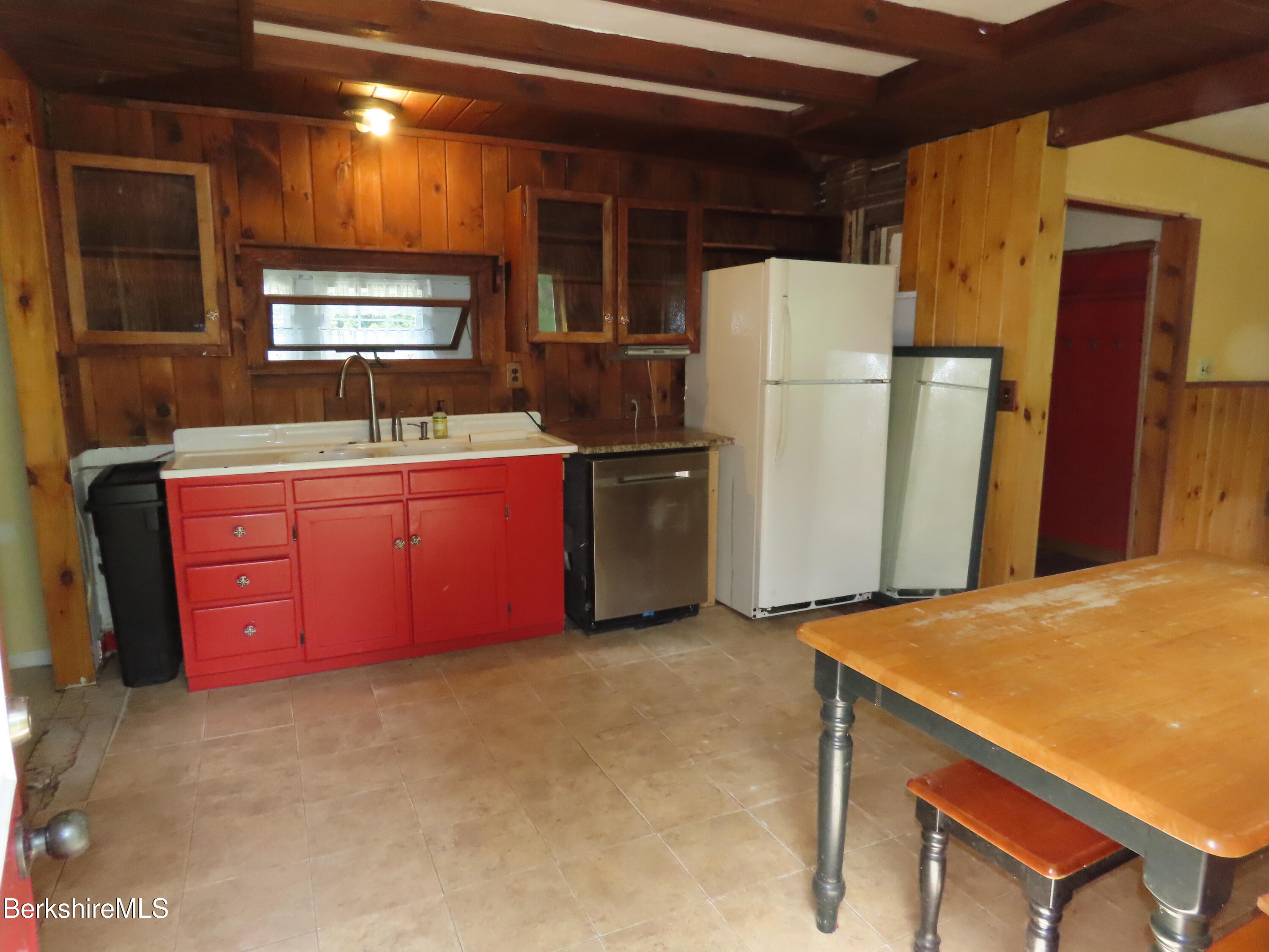 450 River Road Clarksburg, MA 01247 - Photo 10 of 45 a kitchen with stainless steel appliances a refrigerator and a stove