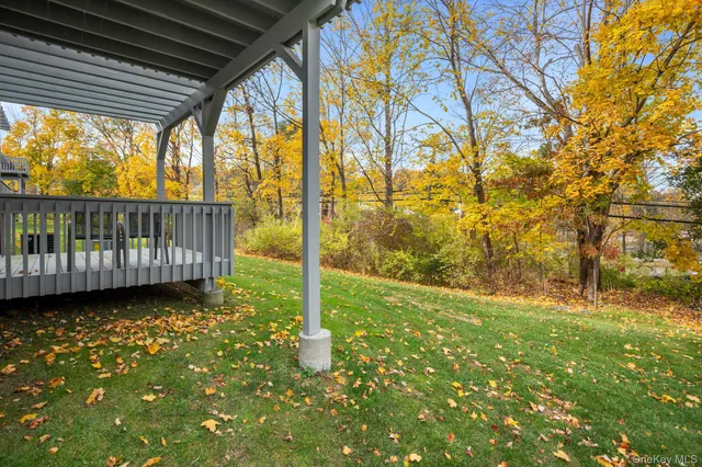 a view of balcony with wooden floor