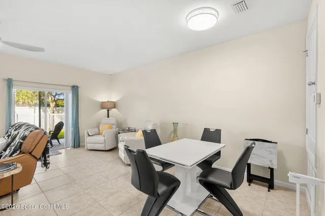 a view of a dining room with furniture