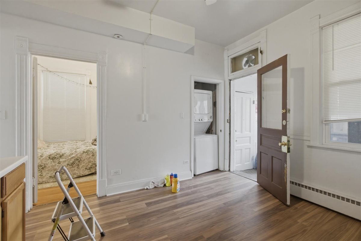 3507 North Seminary Avenue, Unit 2F Chicago, IL 60657 - Photo 5 of 10 a view of empty room with wooden floor