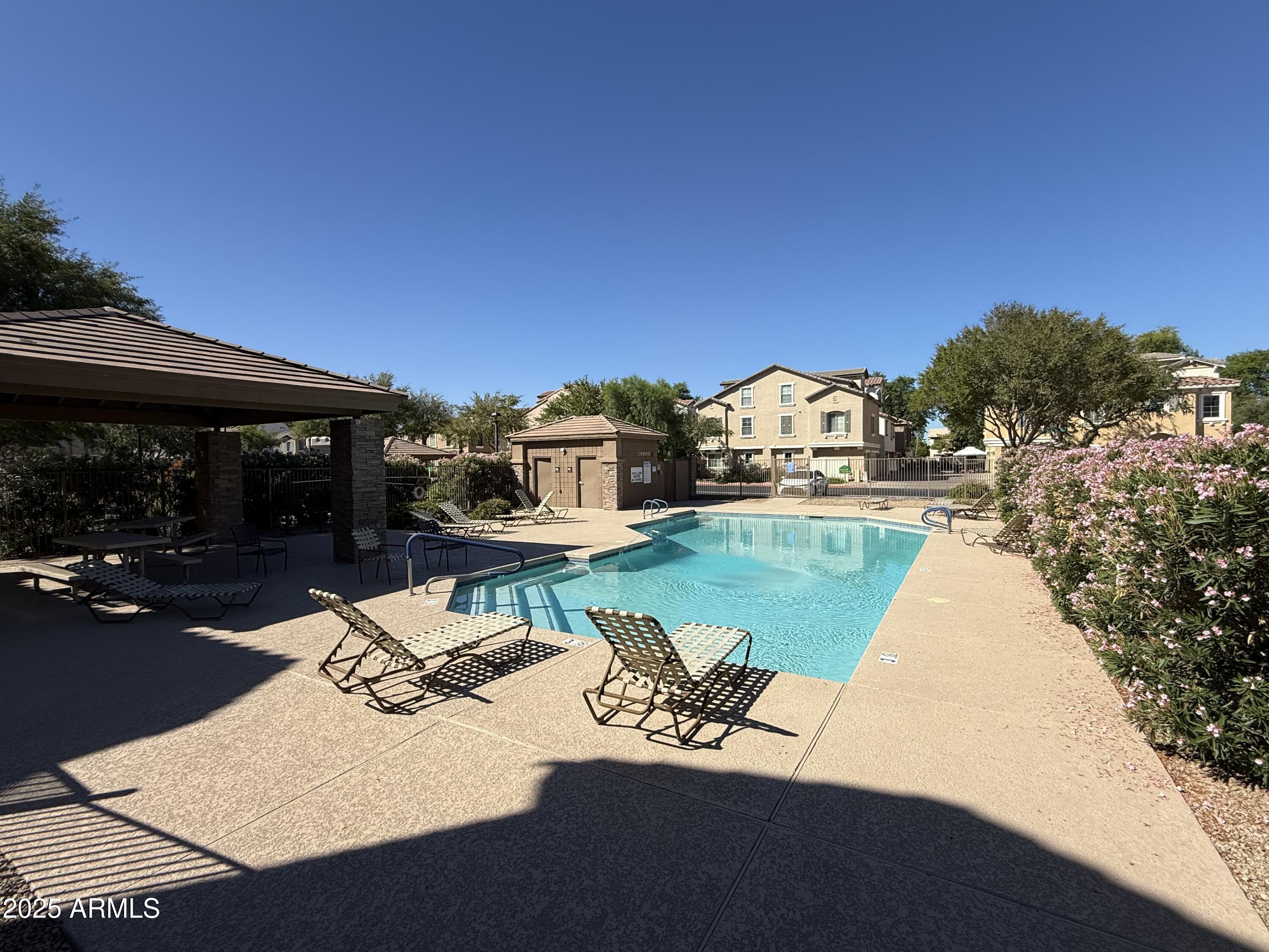 945 West Wendy Way Gilbert, AZ 85233 - Photo 33 of 35 a view of a house with pool and a yard