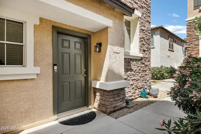 a front view of a house with a garage