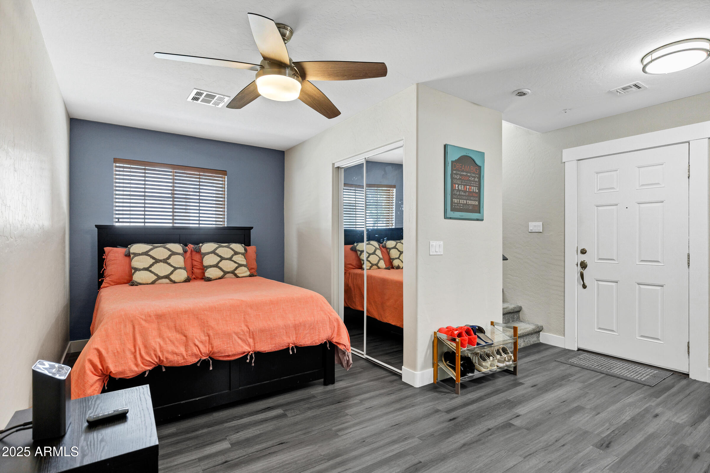 945 West Wendy Way Gilbert, AZ 85233 - Photo 8 of 35 a bedroom with a bed and wooden floor