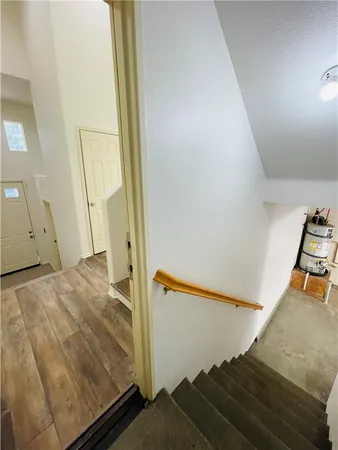 kids bedroom with wooden floor and windows