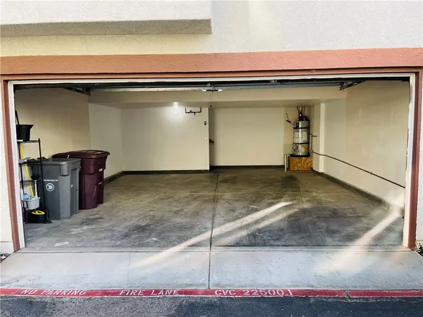 a view of a room with a wooden floor