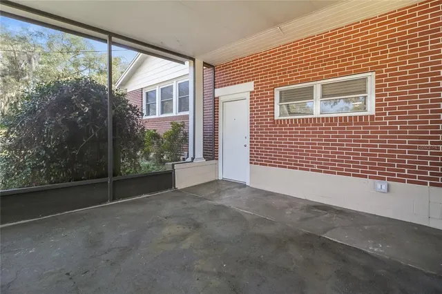 a view of an empty room with a balcony