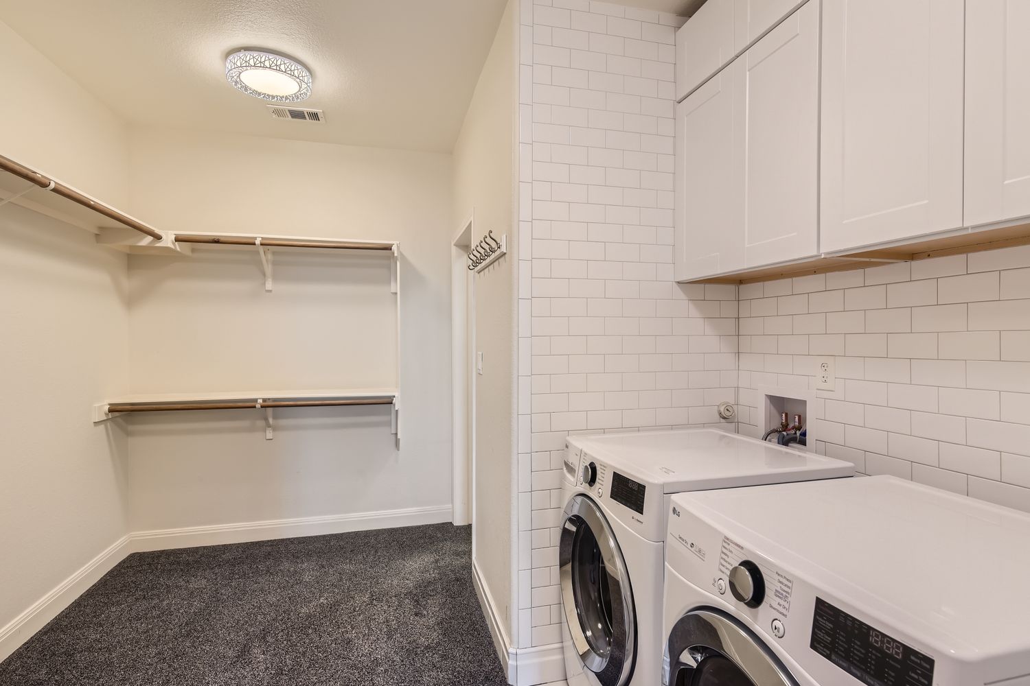 236 Aria Ridge, Unit 236 Lakeway, TX 78738 - Photo 15 of 24 a utility room with dryer and washer