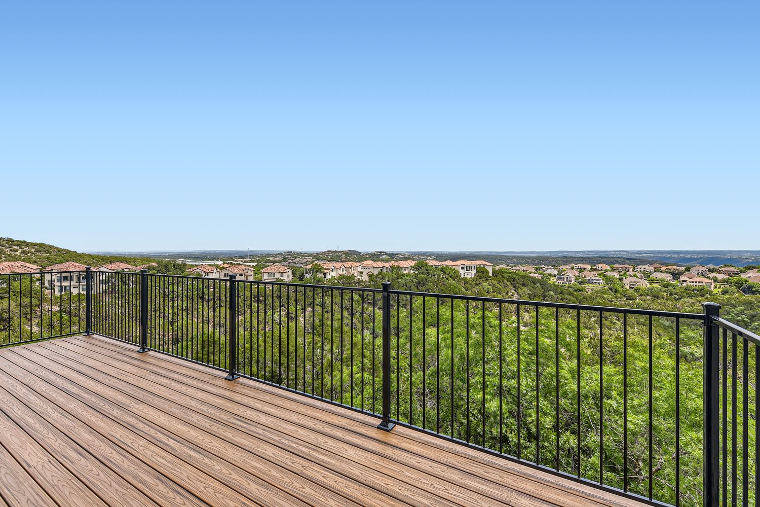 236 Aria Ridge, Unit 236 Lakeway, TX 78738 - Photo 19 of 24 a view of a balcony with an ocean view