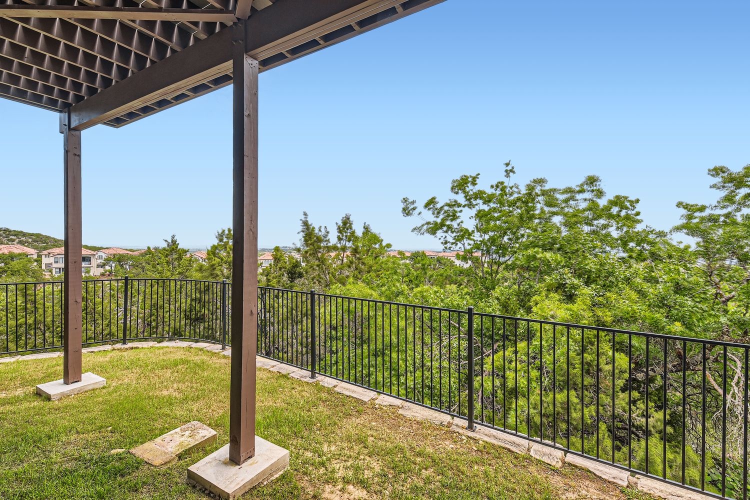 236 Aria Ridge, Unit 236 Lakeway, TX 78738 - Photo 21 of 24 a balcony with street view