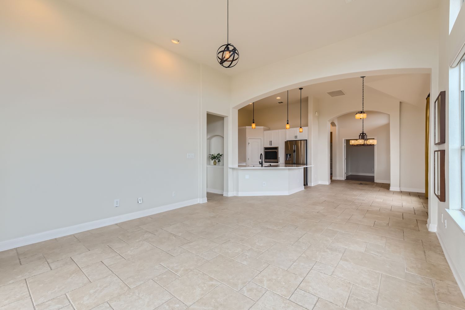 236 Aria Ridge, Unit 236 Lakeway, TX 78738 - Photo 5 of 24 a view of a white building with entryway