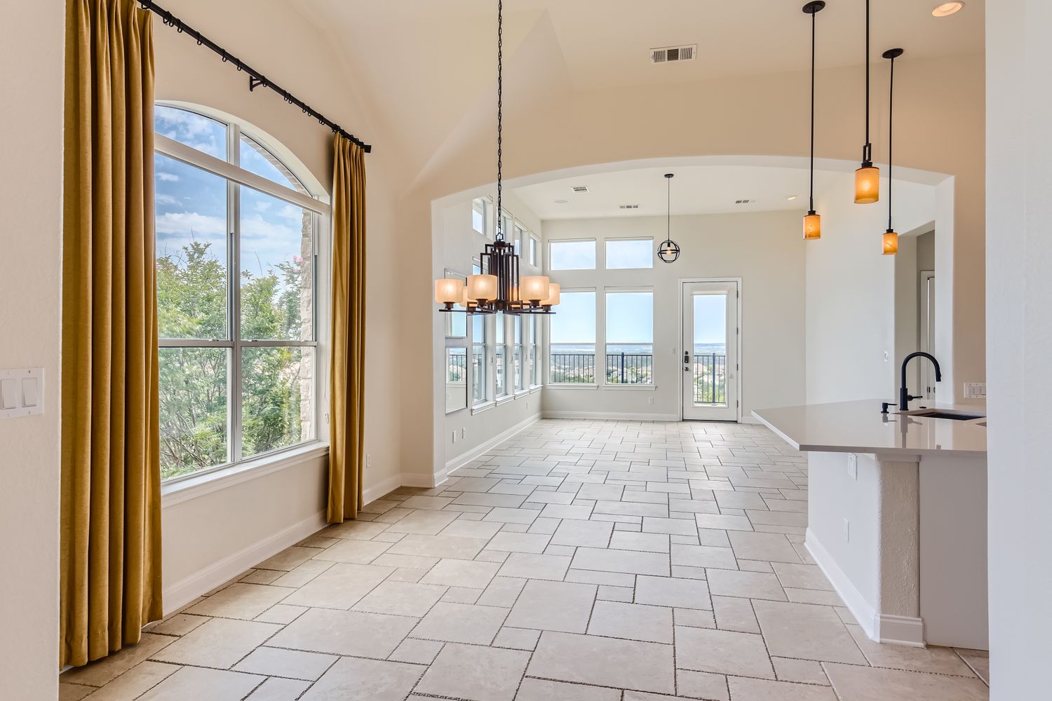 236 Aria Ridge, Unit 236 Lakeway, TX 78738 - Photo 8 of 24 a view of a room with wooden floor and windows