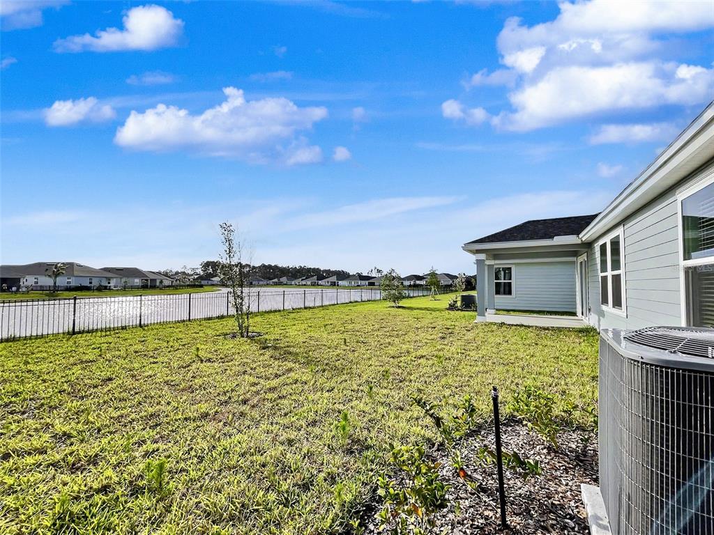 55 Signet Circle Flagler Beach, FL 32136 - Photo 26 of 39 a view of a house with a yard