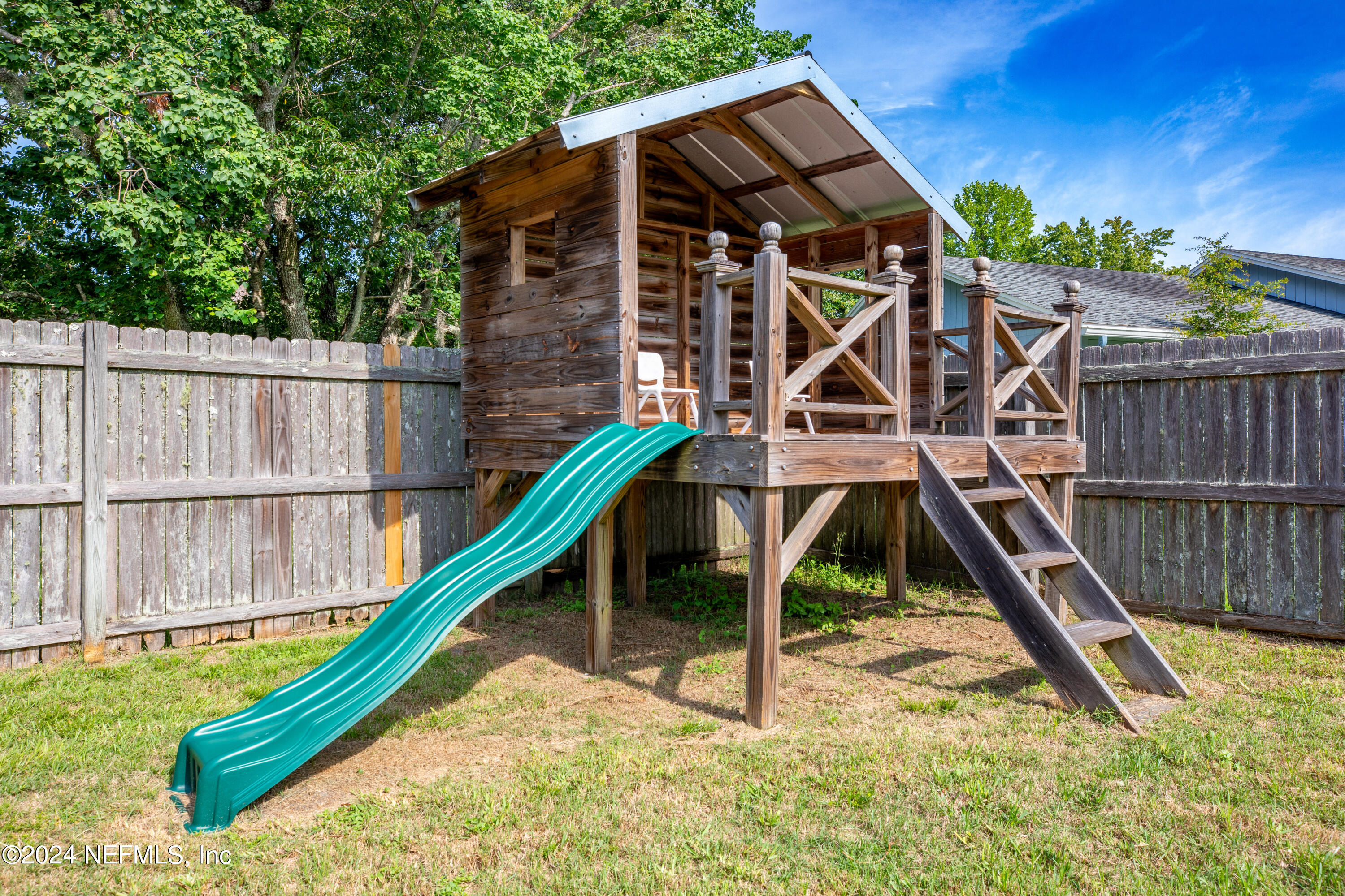 8691 Hammond Forest Drive Jacksonville, FL 32221 - Photo 26 of 28 a view of wooden deck with a small yard and deck