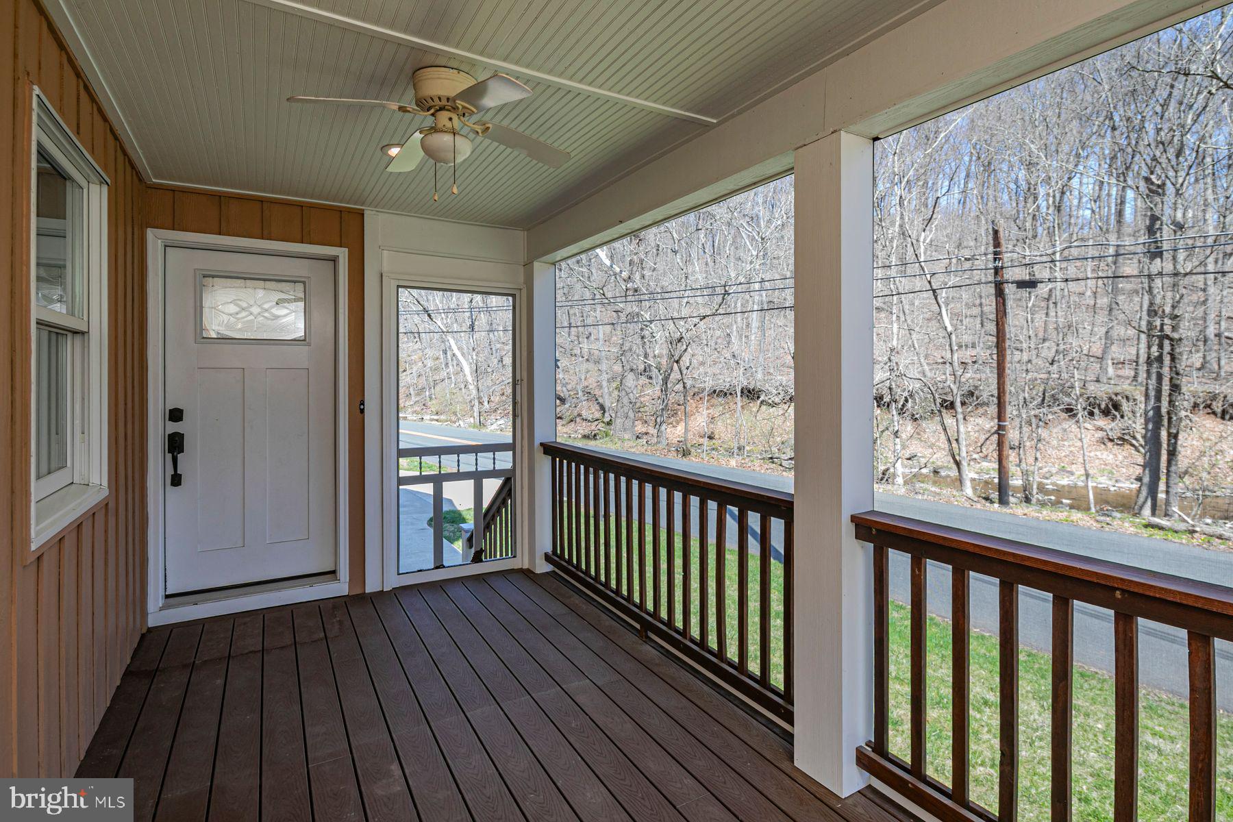 310 Hollow Road Skillman, NJ 08558 - Photo 16 of 32 a view of hallway with wooden floor