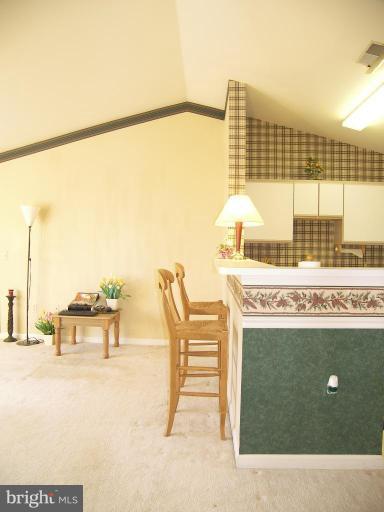 673 Constellation Square Southeast, Unit J Leesburg, VA 20175 - Photo 18 of 25 a view of living room with furniture