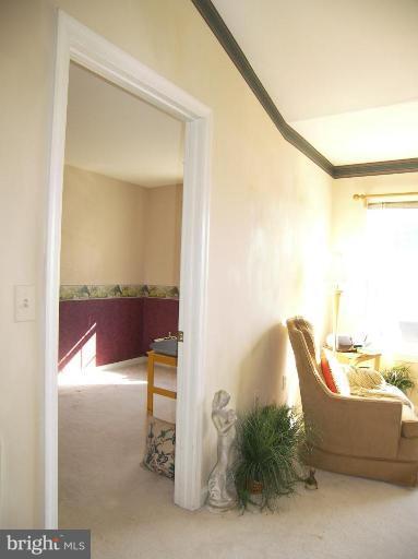 673 Constellation Square Southeast, Unit J Leesburg, VA 20175 - Photo 5 of 25 a view of a living room and a bathroom