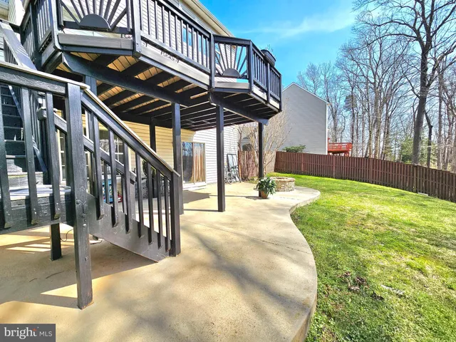 a view of a backyard with a patio