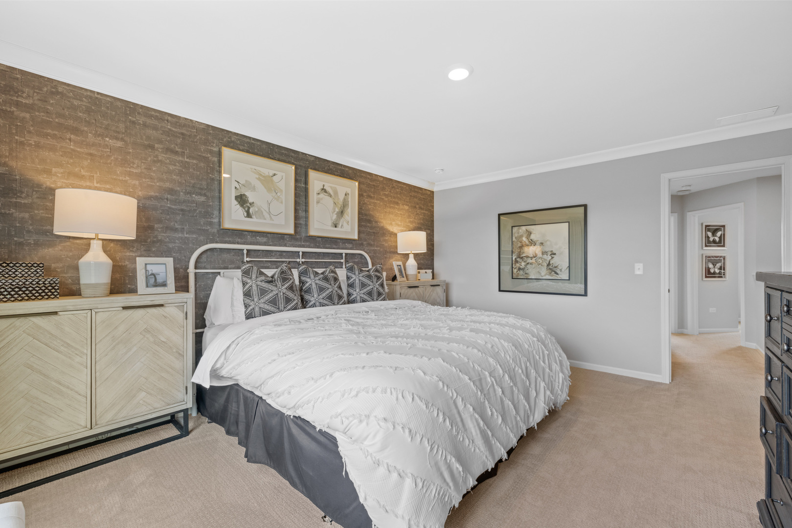 525 Wolverine Drive Aurora, IL 60502 - Photo 18 of 33 a bedroom with a large bed and a lamp on dresser