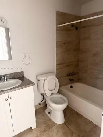 a view of an ocean & beach