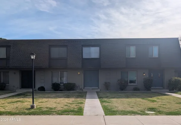 a view of a house with entertaining space