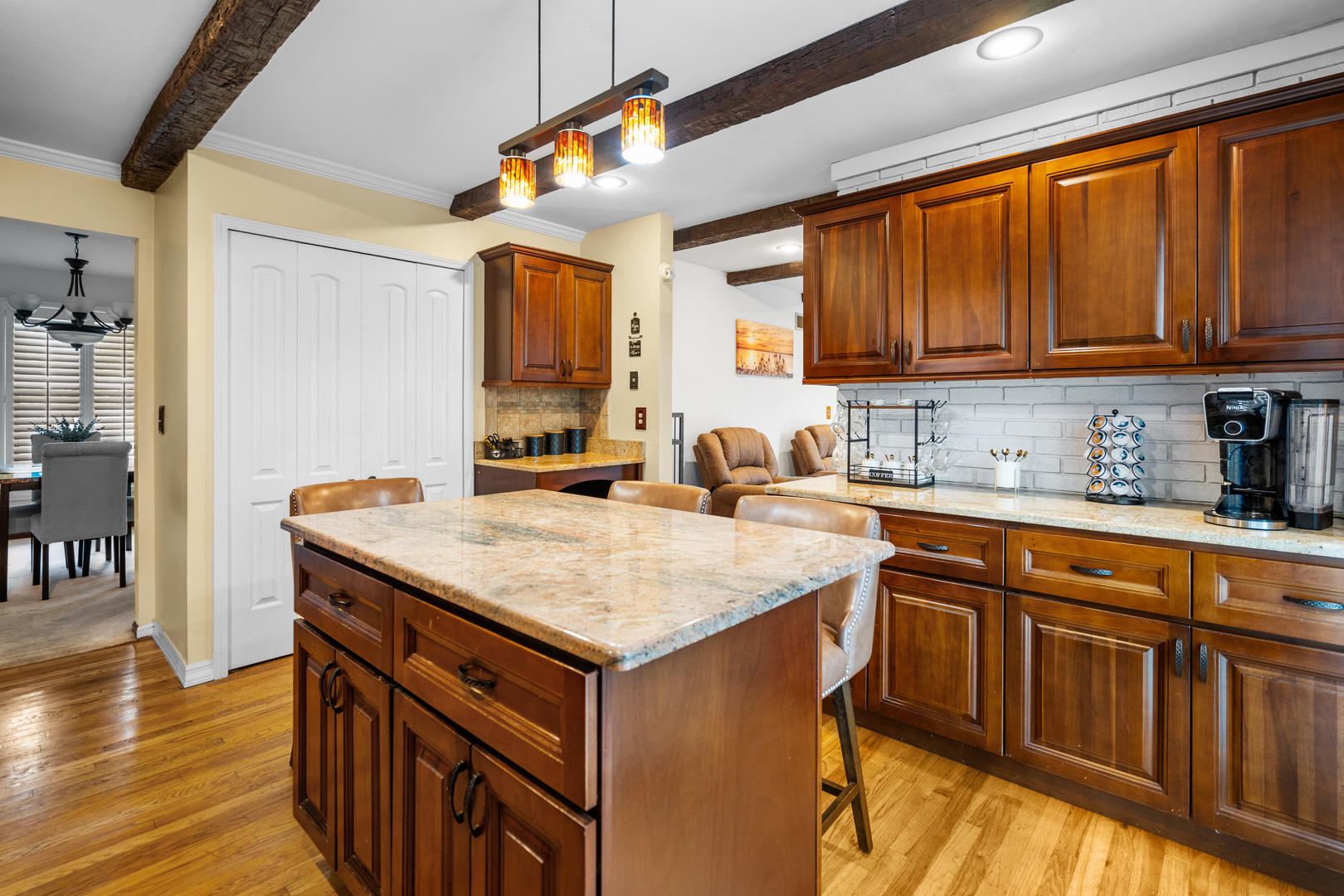 3479 Ronald Road Crete, IL 60417 - Photo 11 of 38 a kitchen with granite countertop a sink stove and cabinets