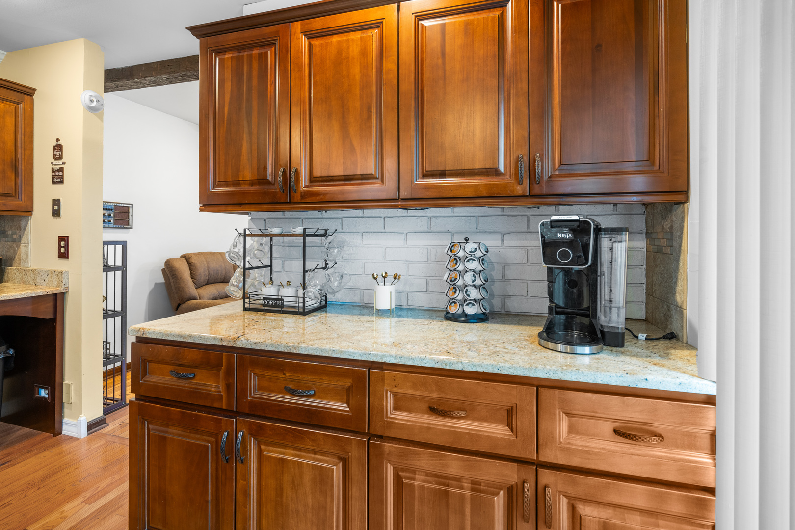3479 Ronald Road Crete, IL 60417 - Photo 13 of 38 a kitchen with granite countertop wooden cabinets and granite counter tops
