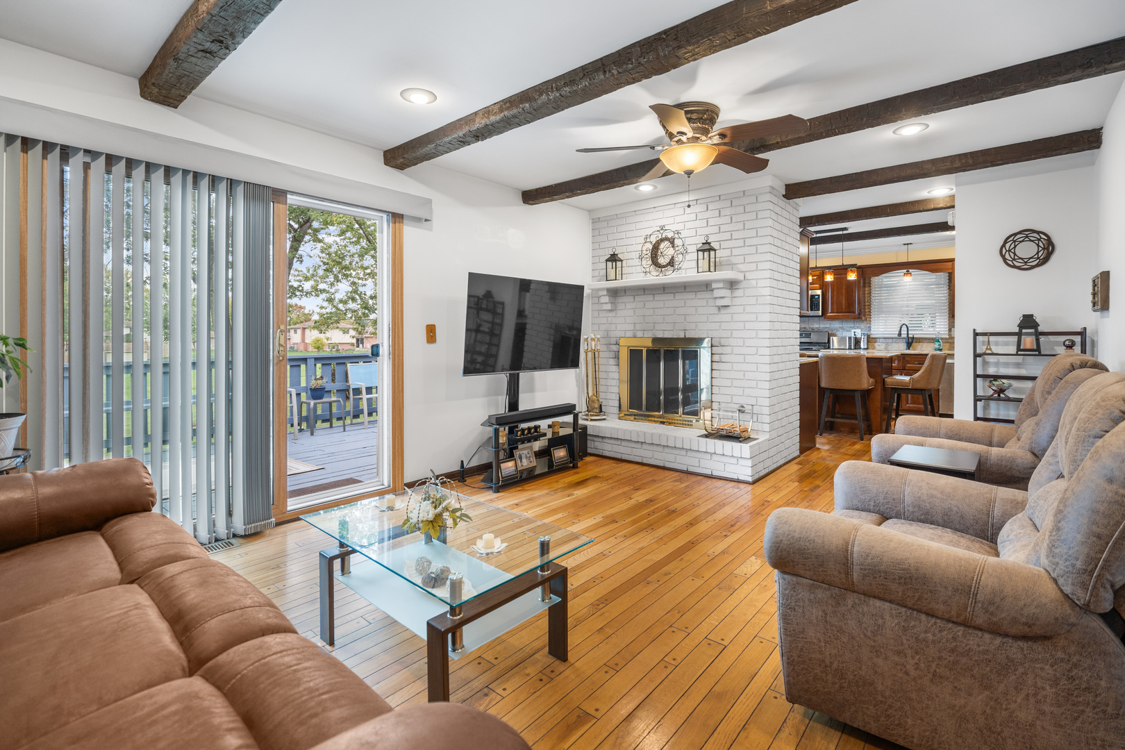 3479 Ronald Road Crete, IL 60417 - Photo 14 of 38 a living room with furniture ceiling fan and a fireplace