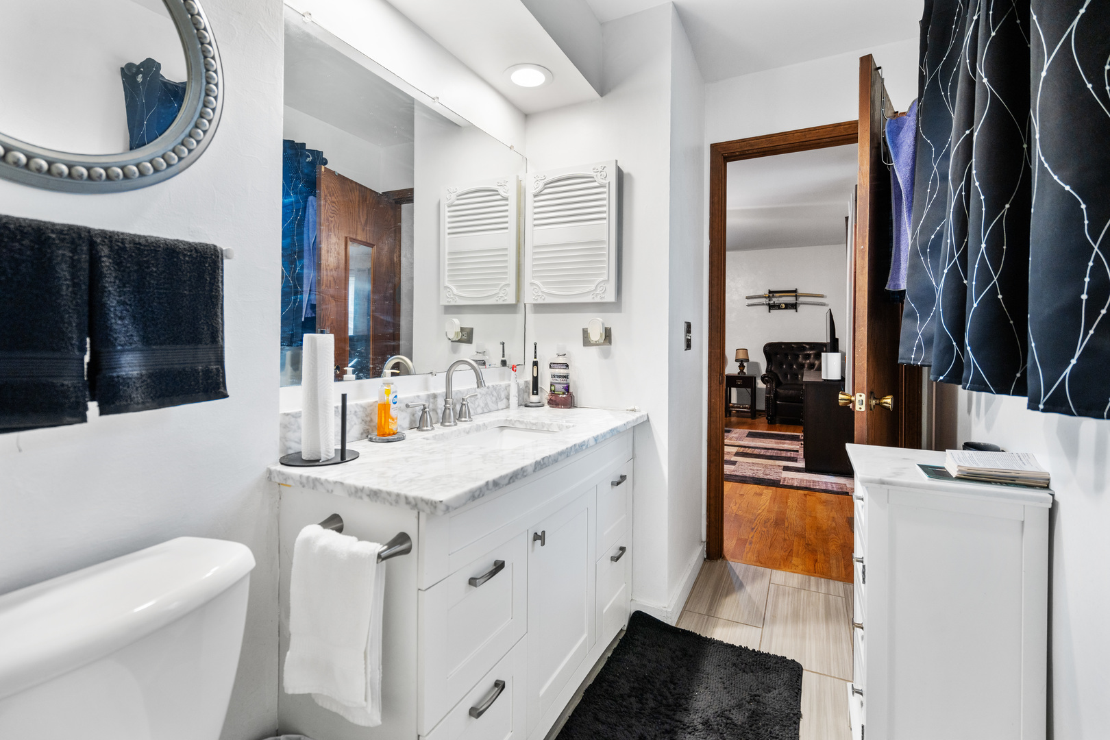 3479 Ronald Road Crete, IL 60417 - Photo 19 of 38 a bathroom with a sink a toilet and a mirror