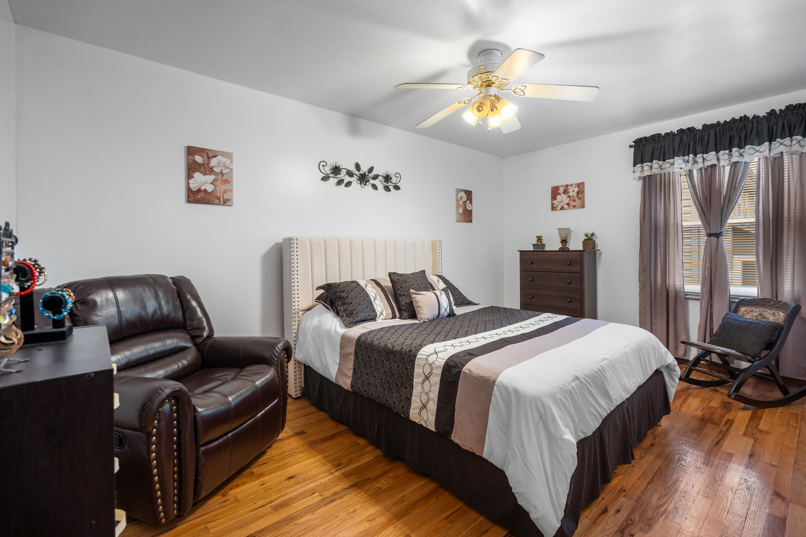 3479 Ronald Road Crete, IL 60417 - Photo 20 of 38 a bed room with a bed and a chandelier